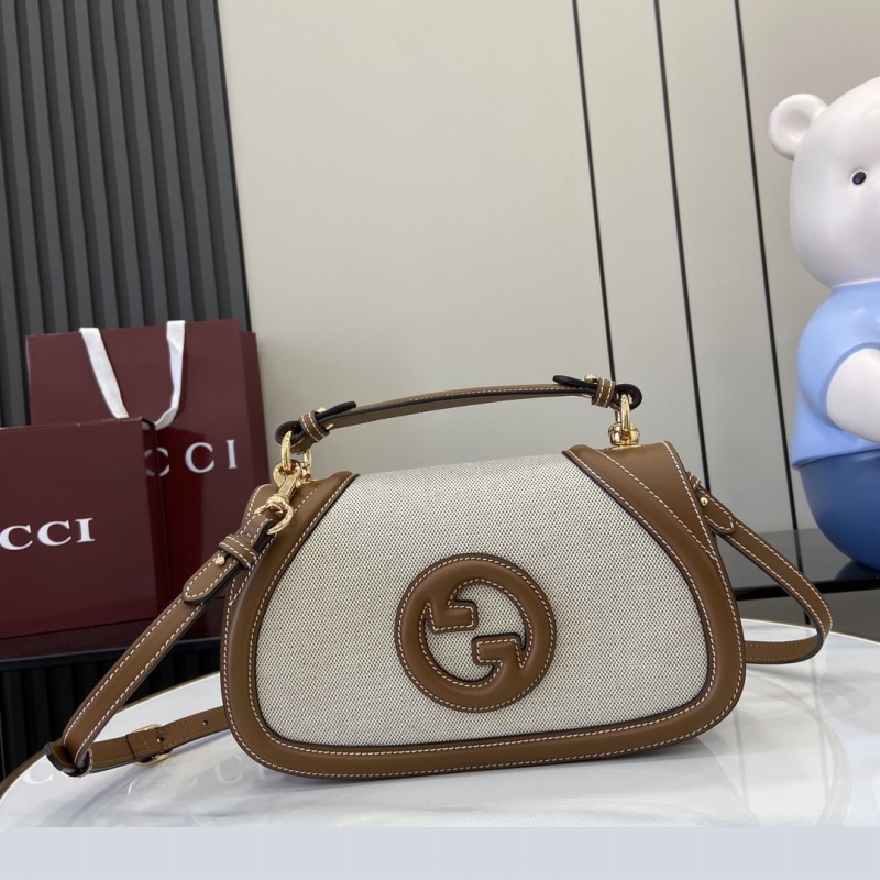 G*u*i top handle bags